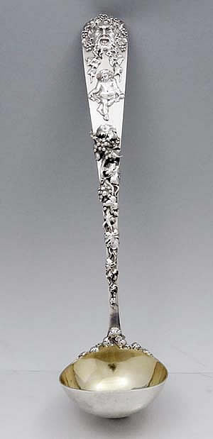 Gorham massive antique sterling silver punch ladle with applied bacchus and grapes with leaves and cherub